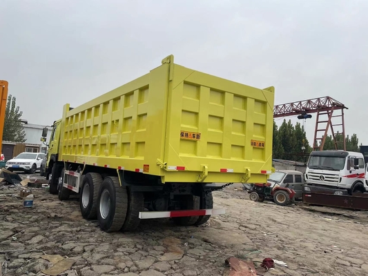 प्रयुक्त HOWO SINOTRUK डंप ट्रक 8x4 सेकंड हैंड HOWO 375 HP टिपर ट्रक बिक्री के लिए